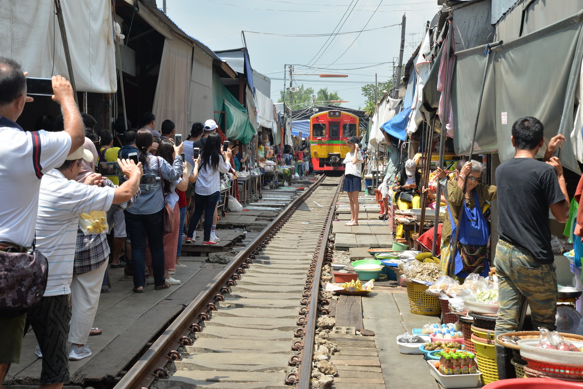 In A Tight Spot | Maeklong Railway Market, Thailand photograph 3