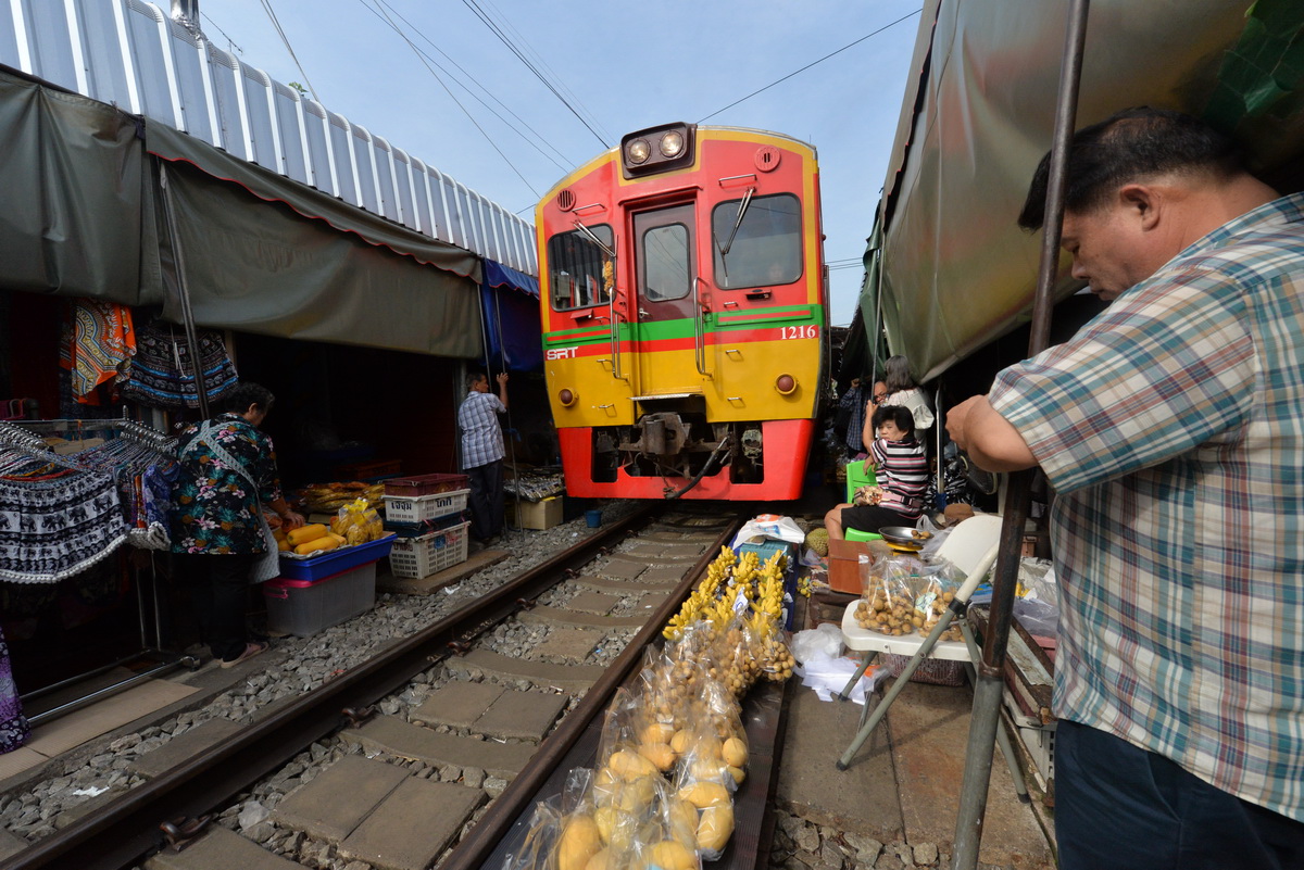In A Tight Spot | Maeklong Railway Market, Thailand photograph 7