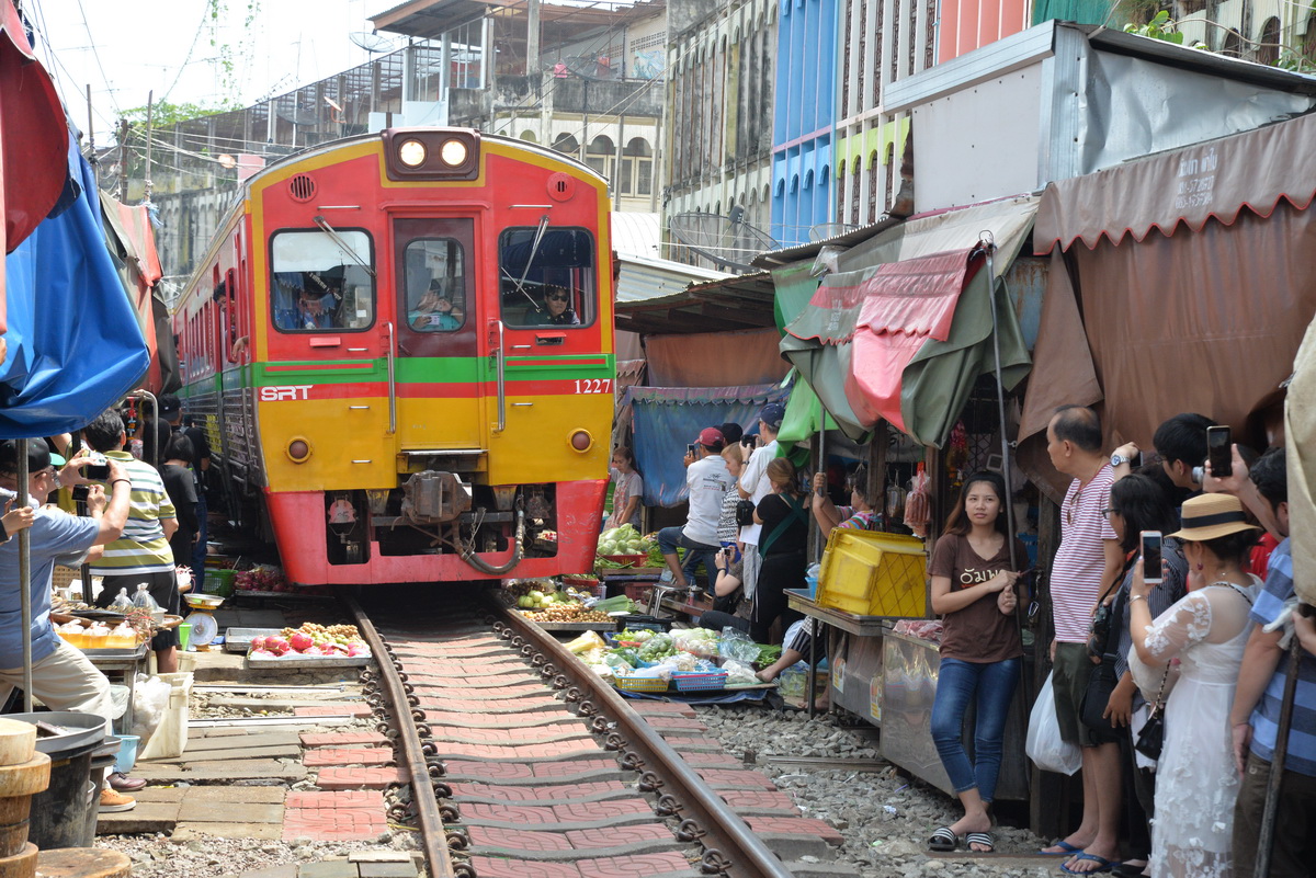 In A Tight Spot | Maeklong Railway Market, Thailand photograph 10